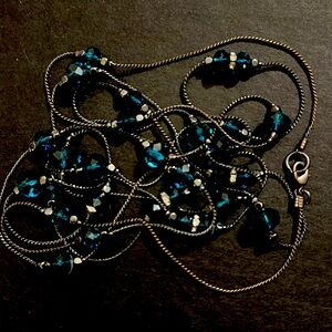 Beautiful turquoise & black metal necklace.  3 feet of necklace!